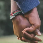 Couple holding hands